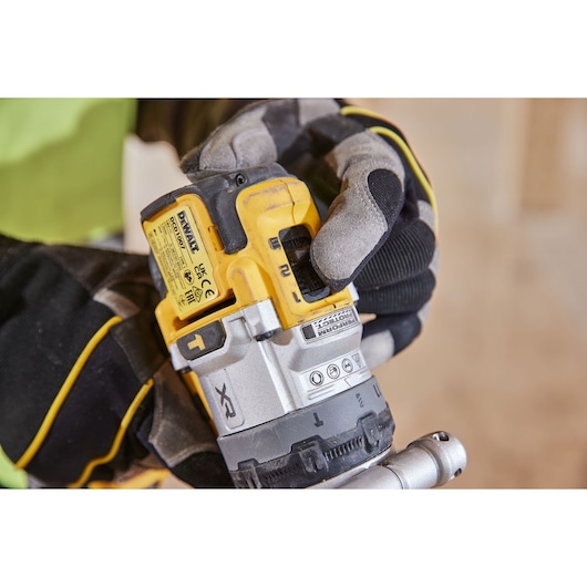 Close up of speed settings button on 18V XR Brushless Premium Hammer Drill Driver