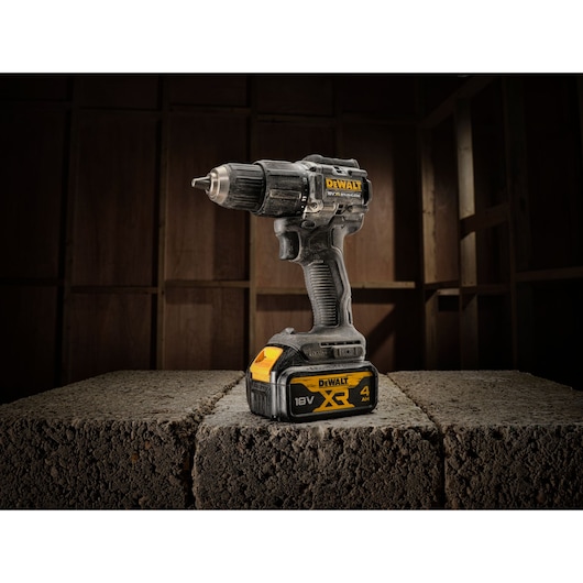 The limited edition 18V Brushless 100 year Hammer Drill Driver sitting on concrete blocks
