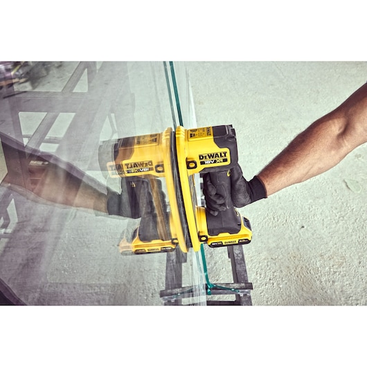 Grabo 18V XR Suction Lifter being attached to a pane of glass