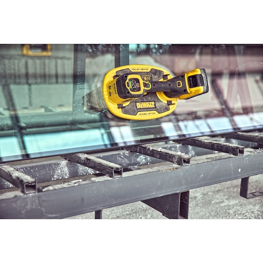 Grabo 18V XR Suction Lifter attached to a pane of glass