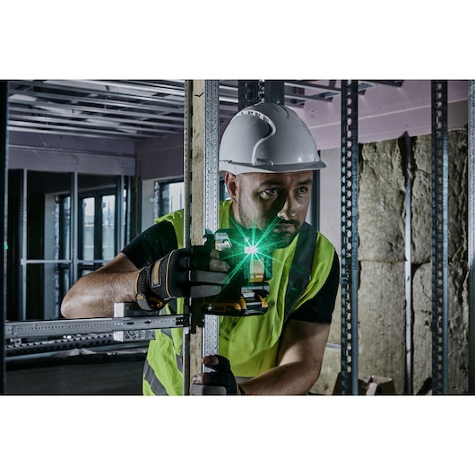 Green Cross Line Laser front on view being used on a construction site