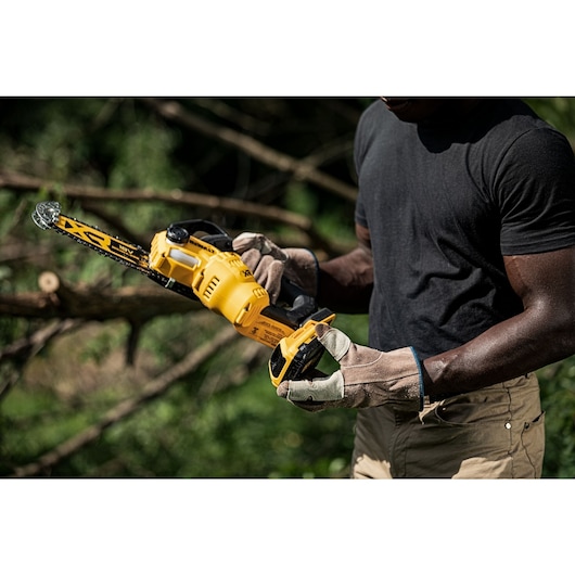 Battery being removed on an 18V XR Brushless Chain Saw