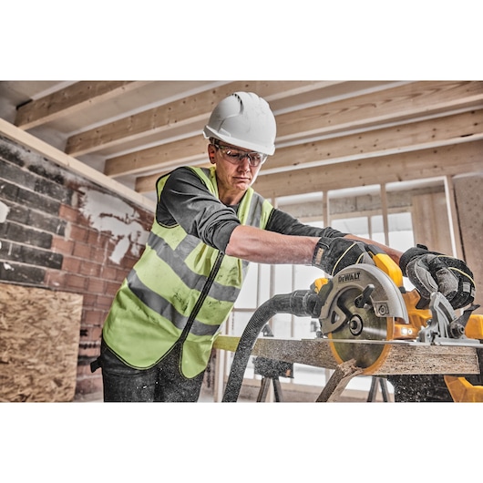 18V XR Brushless Circular Saw 3/4 left view being used on work site