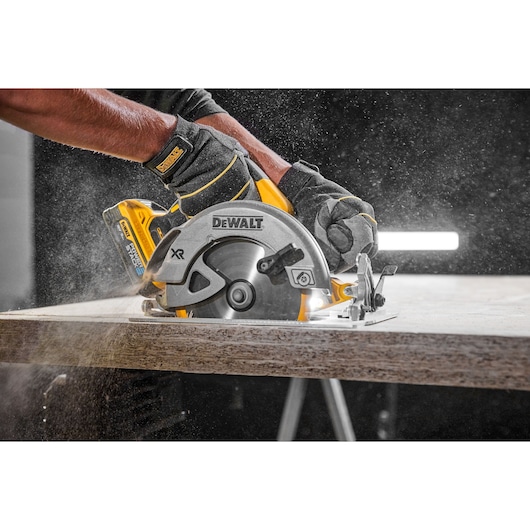 18V XR Brushless Circular Saw left side view being used on work site