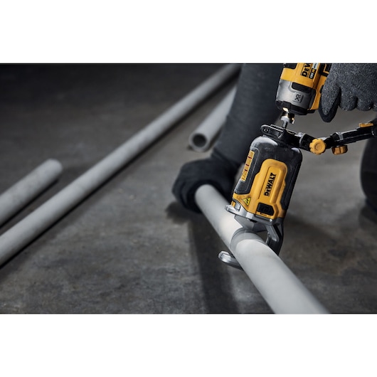 Impact Connect PVC/PEX pipe cutter attachment on Impact Driver cutting PVC pipe
